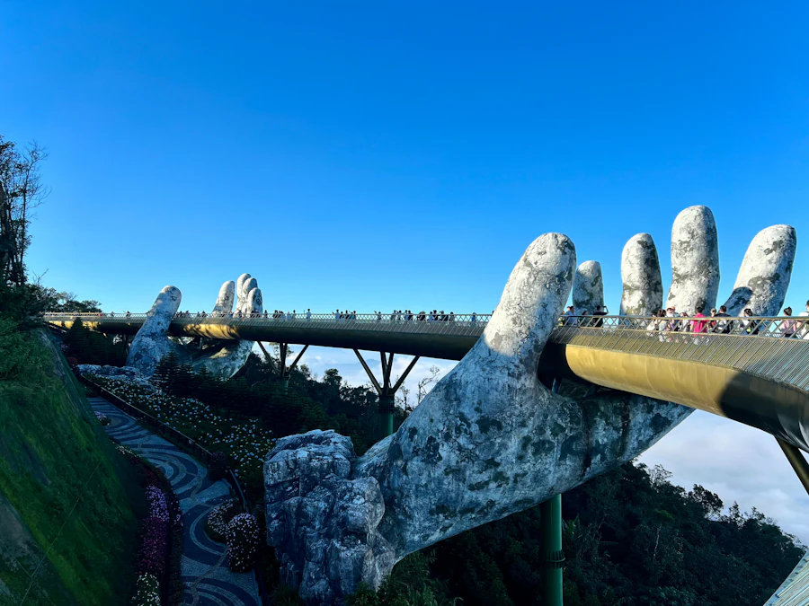 The Golden Bridge held up by giant stone hands in the hills near Da Nang